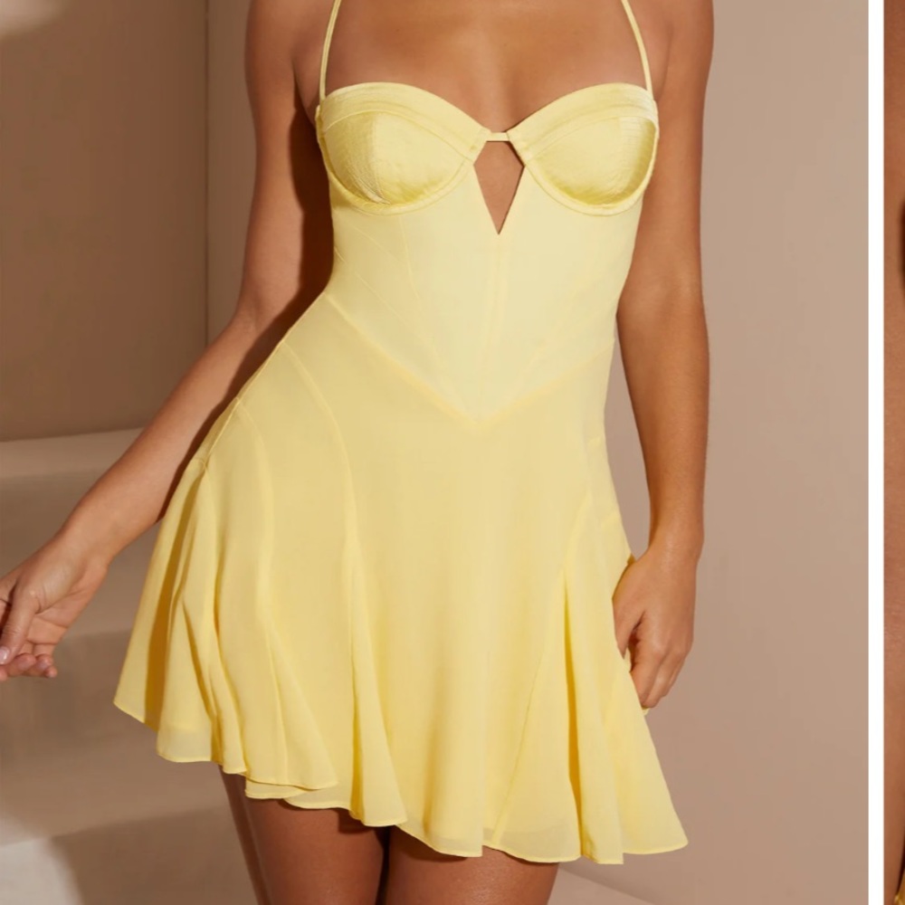 yellow dress like new worn once for 2 hours. Bra cup size C/D. Halter neck